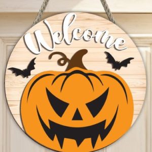"Welcome" Round Sign with Scary Smiling Pumpkin and Bats