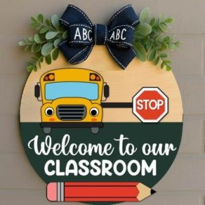 "Welcome to our Classroom" with schoolbus round sign